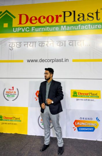 Munshi Interior founder at the DecorPlast Grand Launching Ceremony stage backdrop