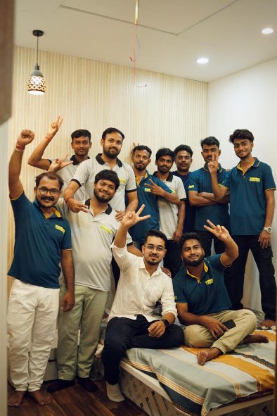 Munshi Interior team celebrating a completed bedroom interior project